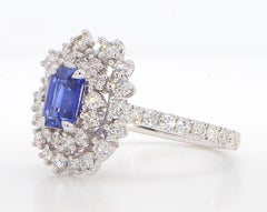 Natural Blue Radiant Sapphire and White Diamond 2.28 Carat TW Gold Cocktail Ring