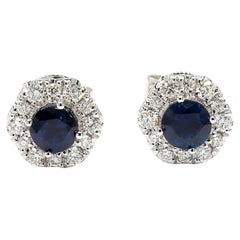 Orecchini con zaffiro rotondo blu naturale e diamante da 0.97 carati TW in oro