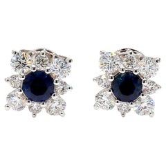 Clous d'oreilles en or de 1.49 carat avec saphirs ronds bleus naturels et diamants