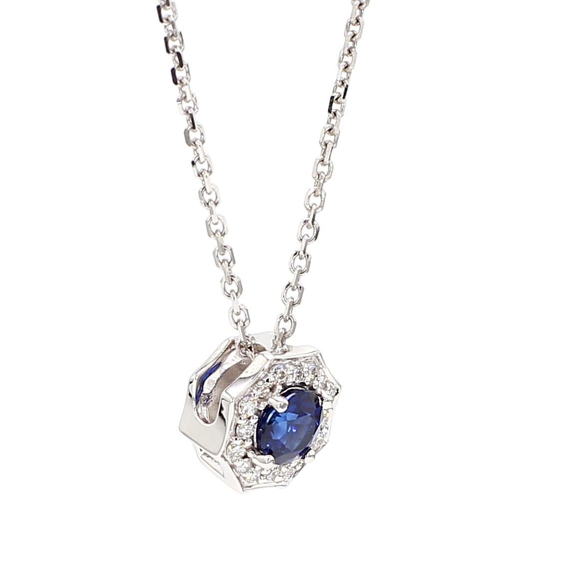 RareGemWorld's beautiful sapphire pendant. Mounted in a beautiful 18K White Gold setting with a natural round cut blue sapphire complimented by natural round cut white diamond melee. This pendant is guaranteed to impress and enhance your personal