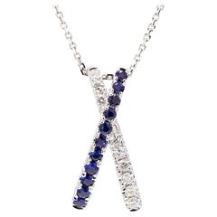 Natural Blue Round Sapphire and White Diamond 0.69 Carat TW Gold Drop Pendant