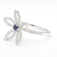 Natural Blue Round Sapphire and White Diamond 0.71 Carat TW Gold Cocktail Ring