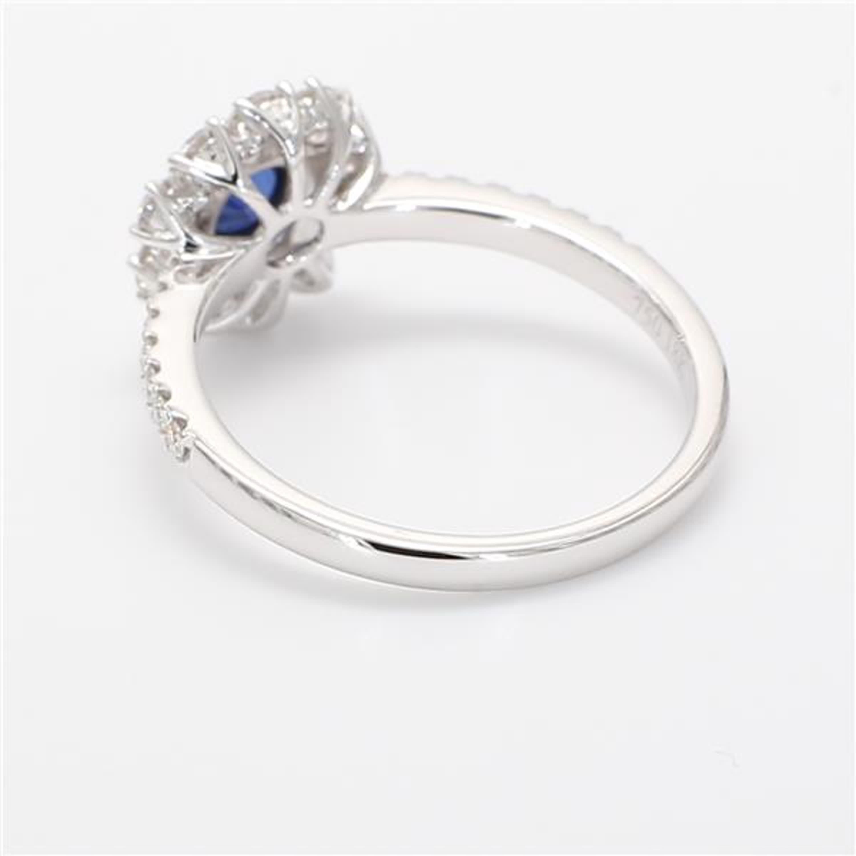 Contemporary Natural Blue Round Sapphire and White Diamond 1.00 Carat TW White Gold Ring For Sale