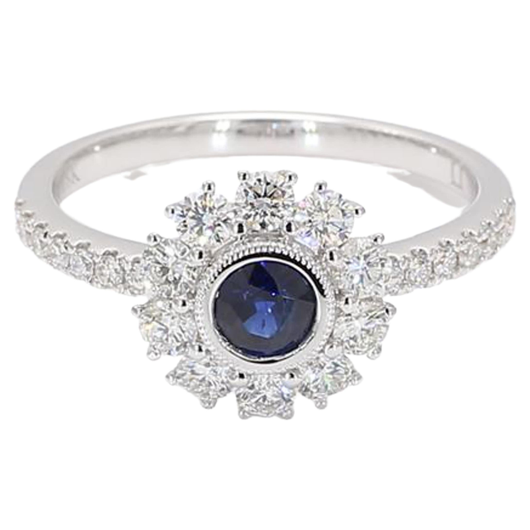 Natural Blue Round Sapphire and White Diamond 1.00 Carat TW White Gold Ring For Sale