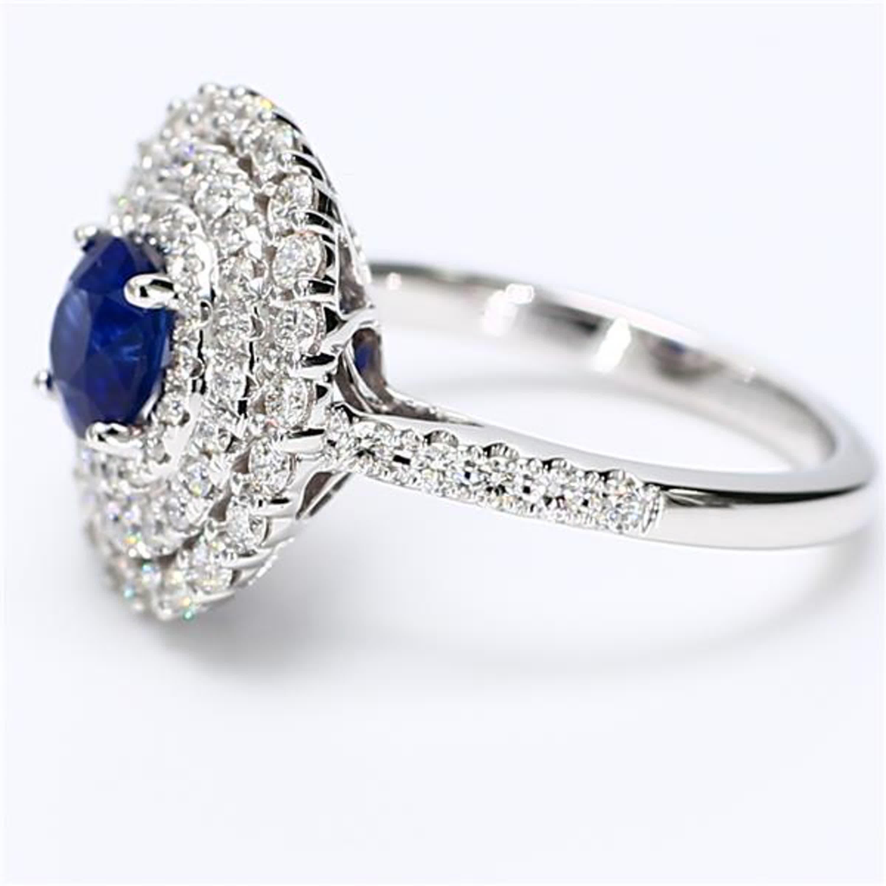 Contemporary Natural Blue Round Sapphire and White Diamond 2.09 Carat TW Gold Cocktail Ring For Sale