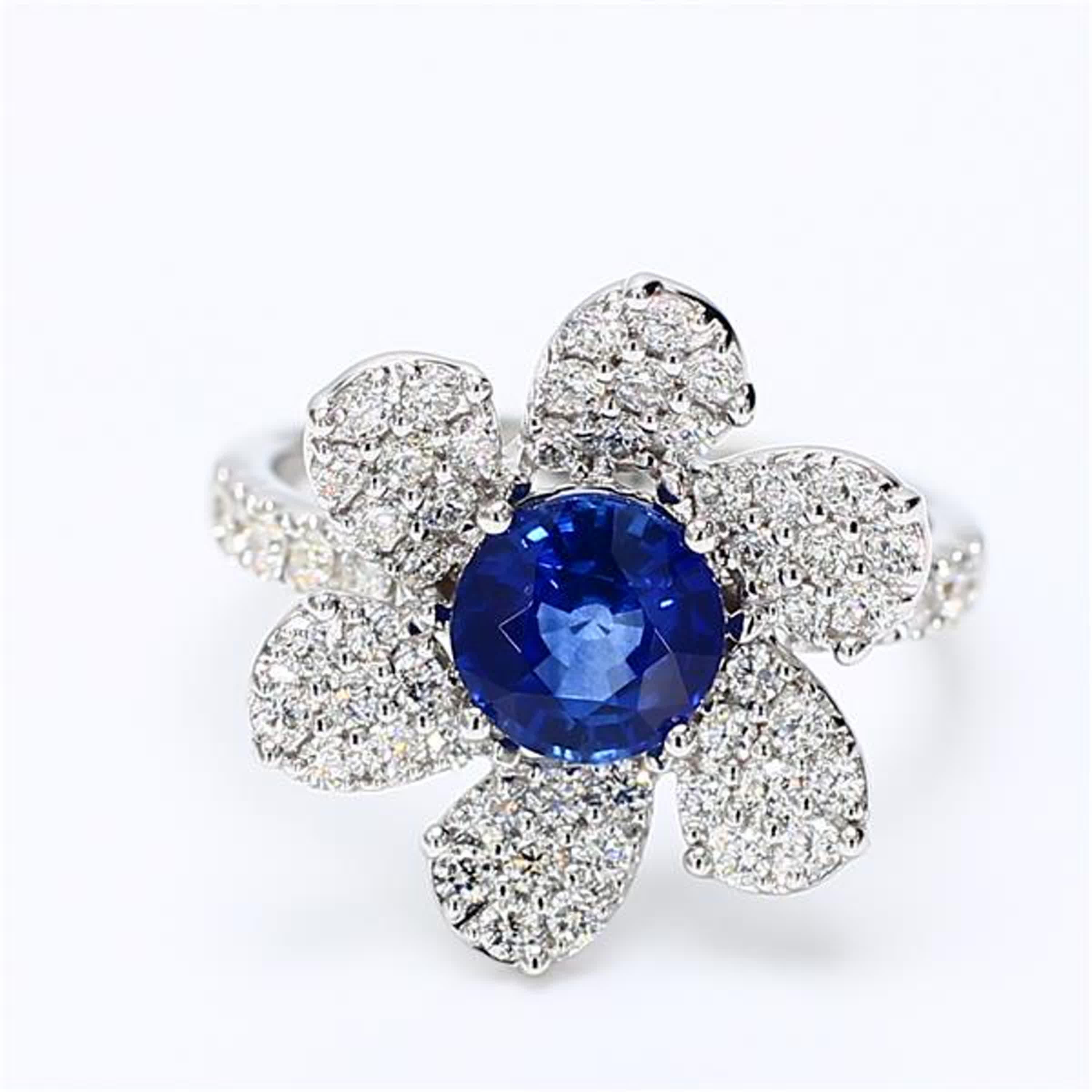 Contemporary Natural Blue Round Sapphire and White Diamond 2.25 Carat TW Gold Cocktail Ring For Sale