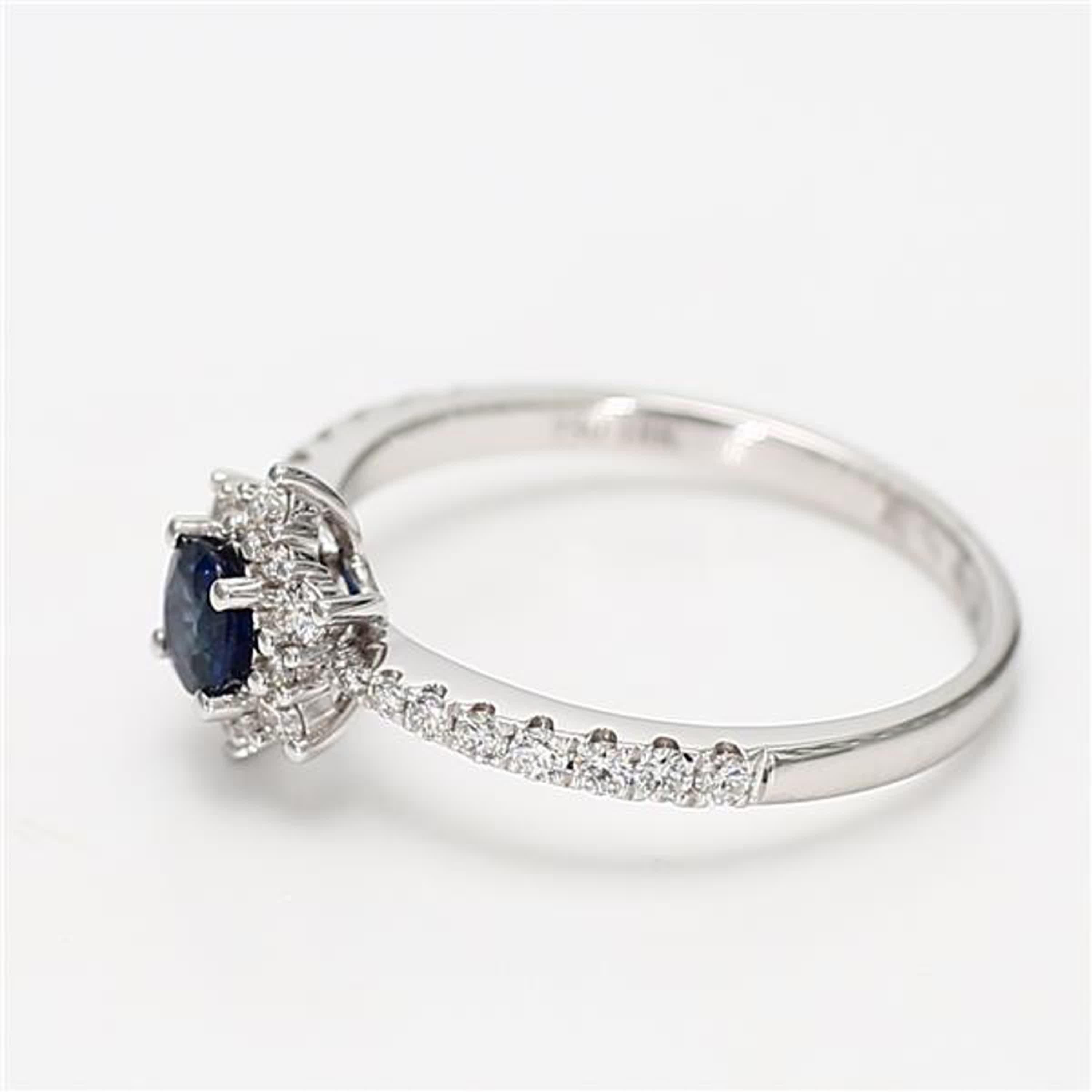 Contemporary Natural Blue Round Sapphire and White Diamond .62 Carat TW Gold Cocktail Ring For Sale