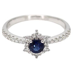 Natural Blue Round Sapphire and White Diamond .62 Carat TW Gold Cocktail Ring