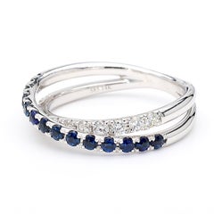 Natural Blue Round Sapphire and White Diamond .84 Carat TW White Gold Band