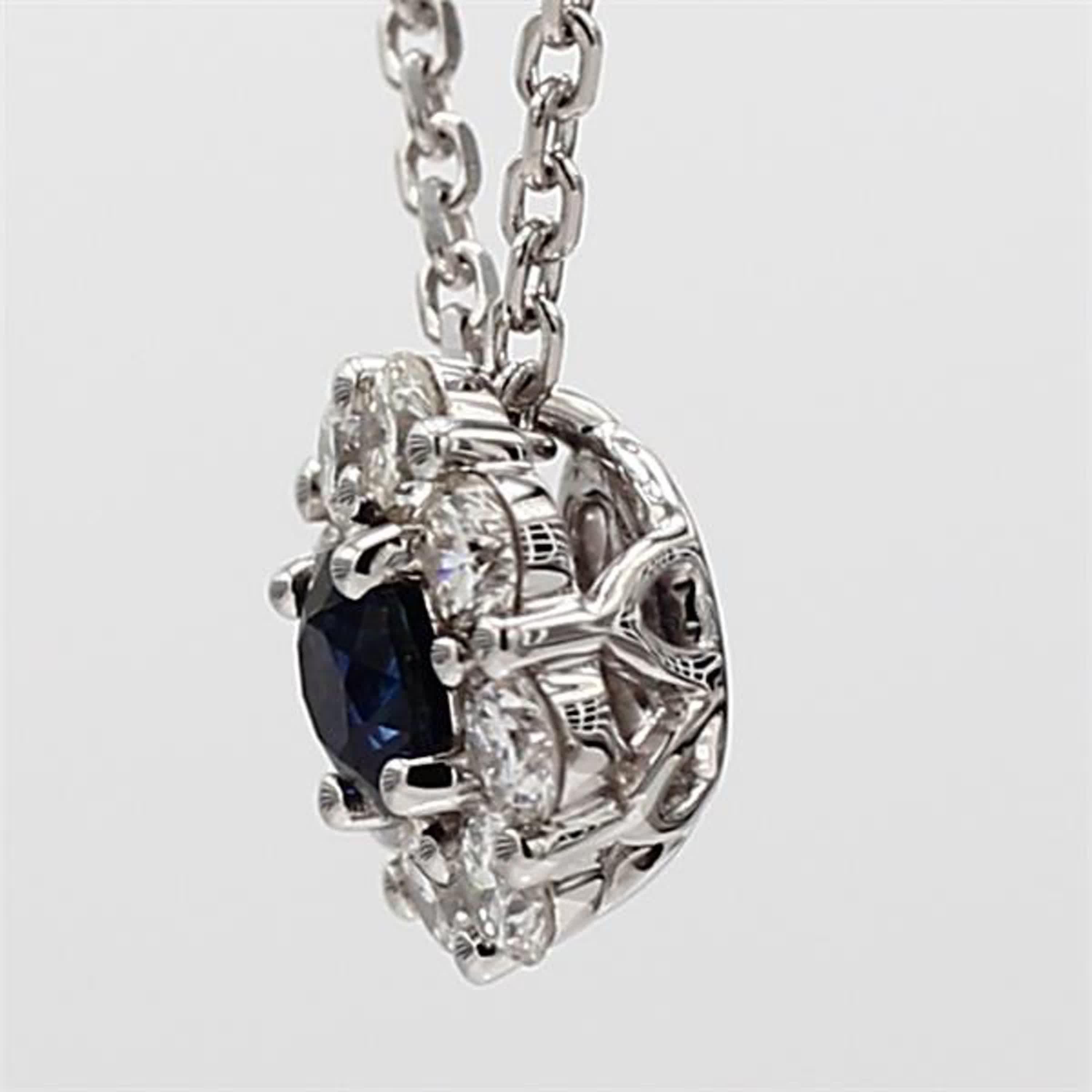 Contemporary Natural Blue Round Sapphire and White Diamond .88 Carat TW White Gold Pendant For Sale