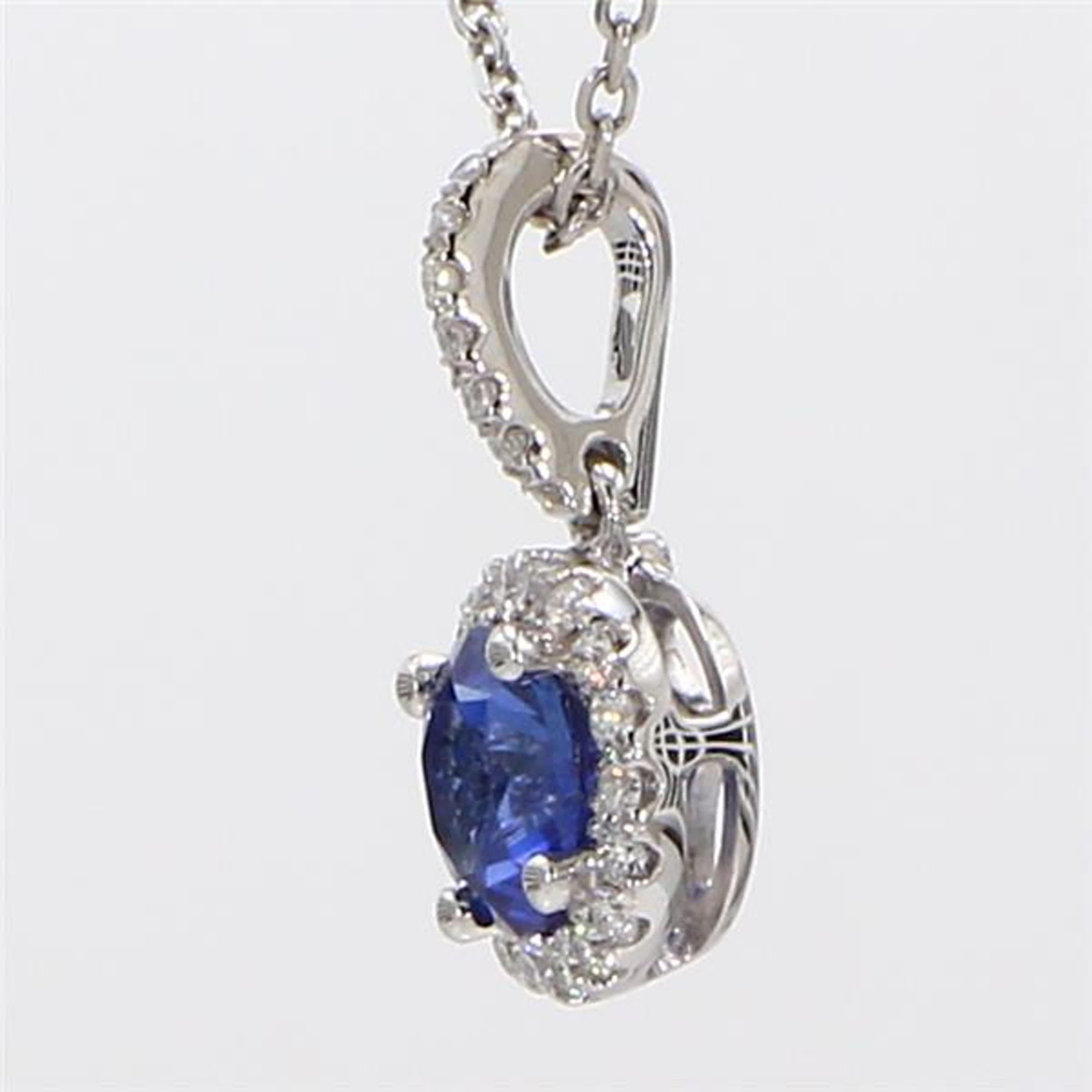 Contemporary Natural Blue Round Sapphire and White Diamond .90 Carat TW White Gold Pendant