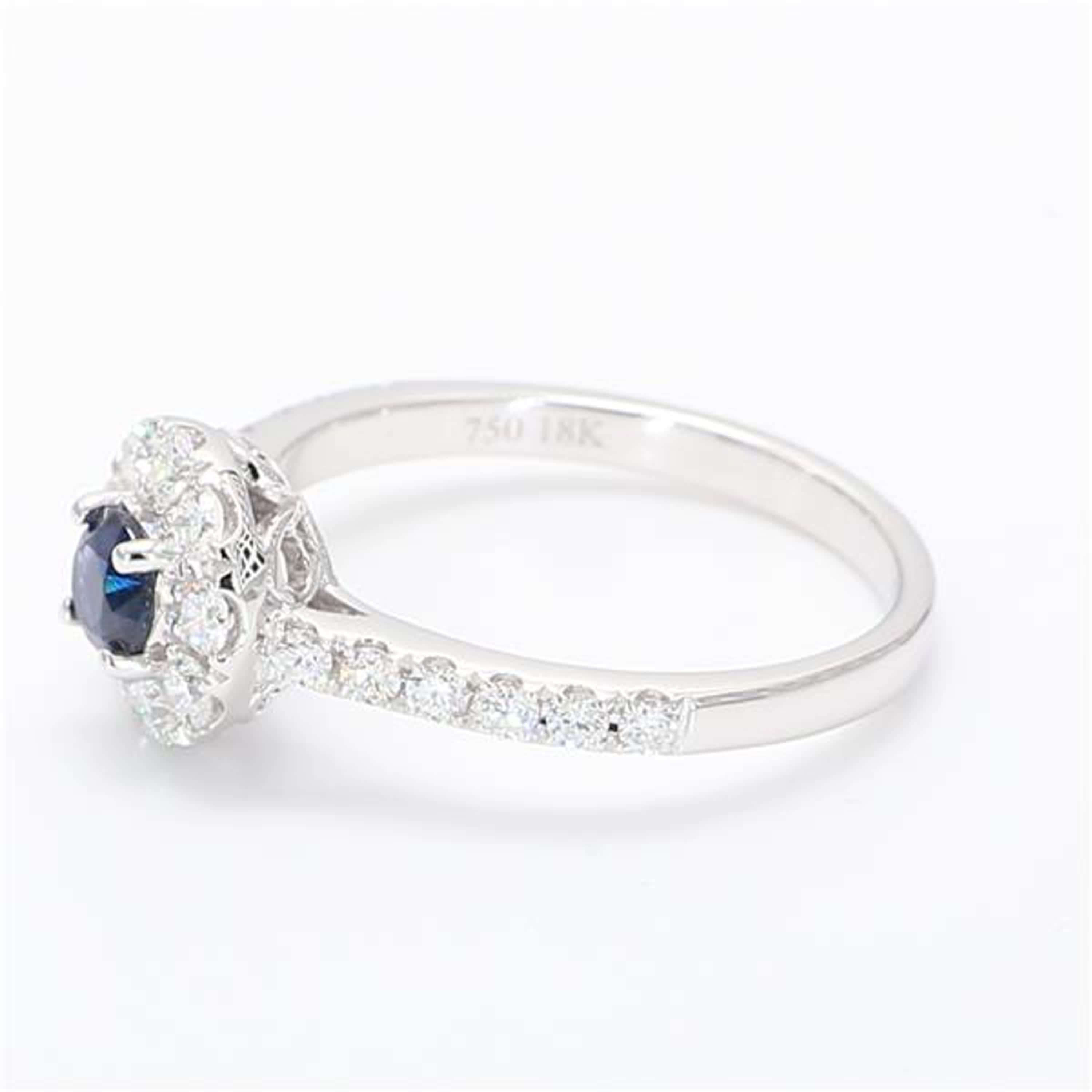Natural Blue Round Sapphire and White Diamond .93 Carat TW White Gold Ring In New Condition For Sale In New York, NY