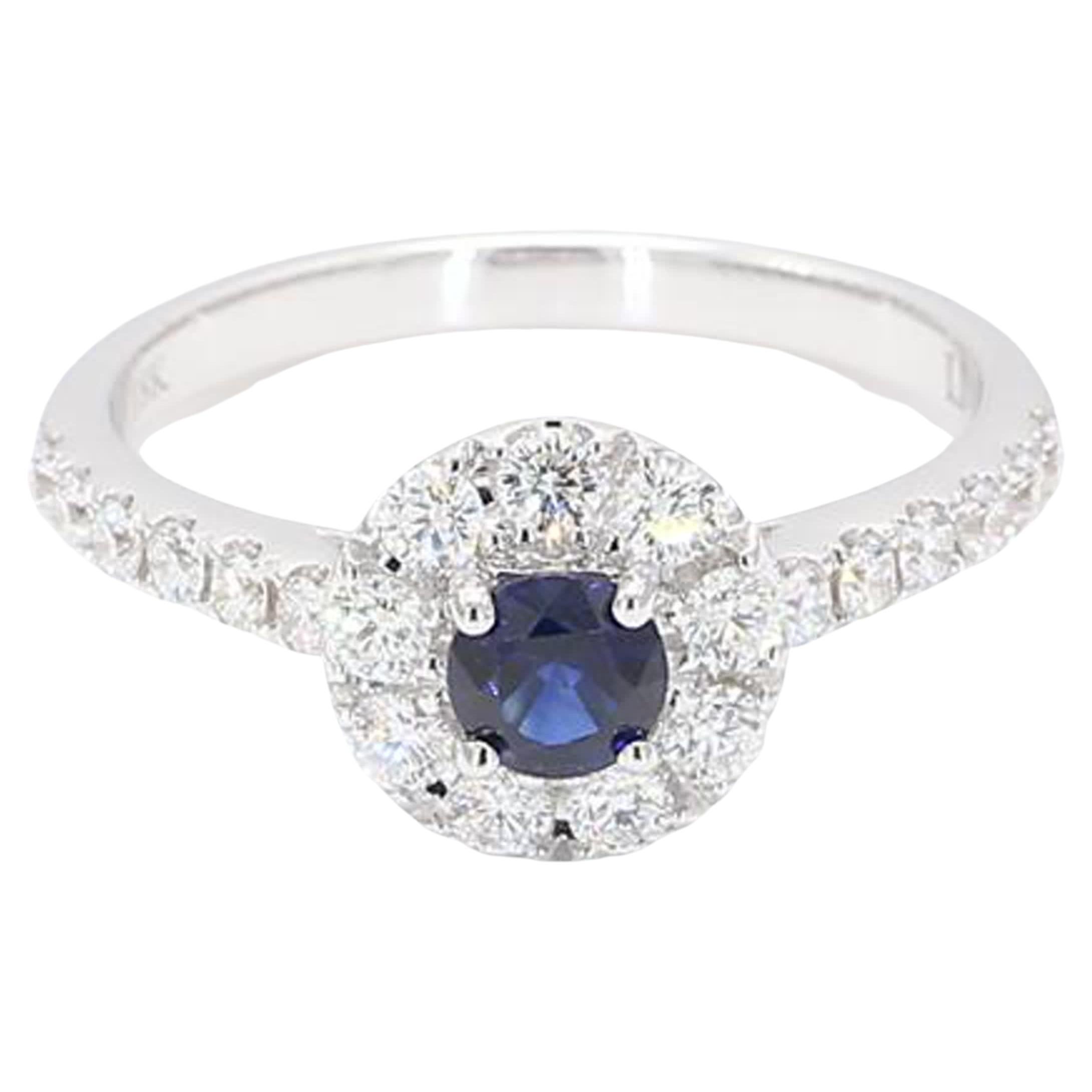 Natural Blue Round Sapphire and White Diamond .93 Carat TW White Gold Ring For Sale