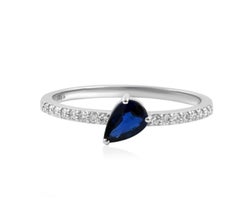 Ring aus 14-karätigem Weißgold mit einem natürlichen blauen Saphir (0,44 Karat) und Diamanten (0,11 Karat)
