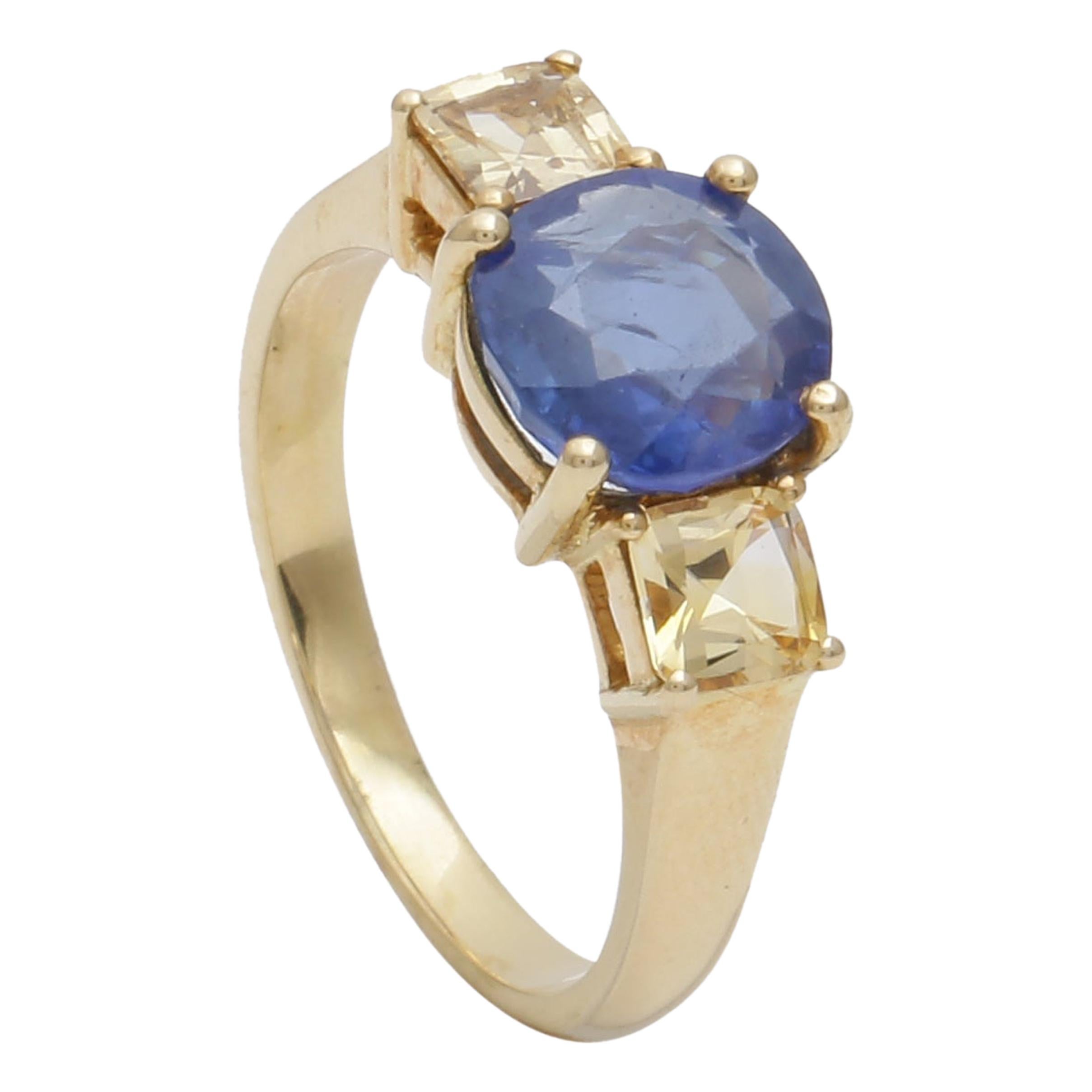 Natural Blue Sapphire 3-Stone Engagement Ring in 18 Karat Yellow Gold For Sale