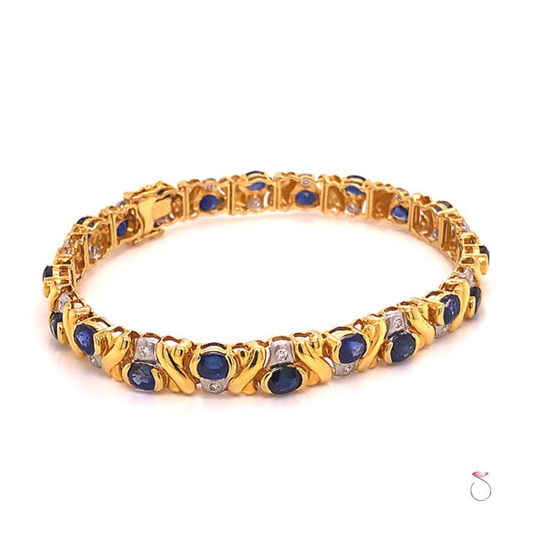 This magnificent Sapphire and Diamond bracelet is absolutely stunning. The bracelet is beautifully crafted 18k yellow gold with white gold accents. This bracelet is set with twenty two (22) oval shape blue Sapphires set in 18k yellow gold semi