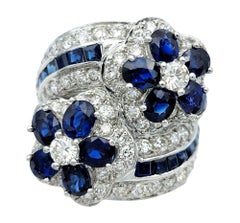Natural Blue Sapphire and Diamond Flower Bypass Ring Set in 18 Karat White Gold