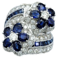 Natural Blue Sapphire and Diamond Flower Bypass Ring Set in 18 Karat White Gold
