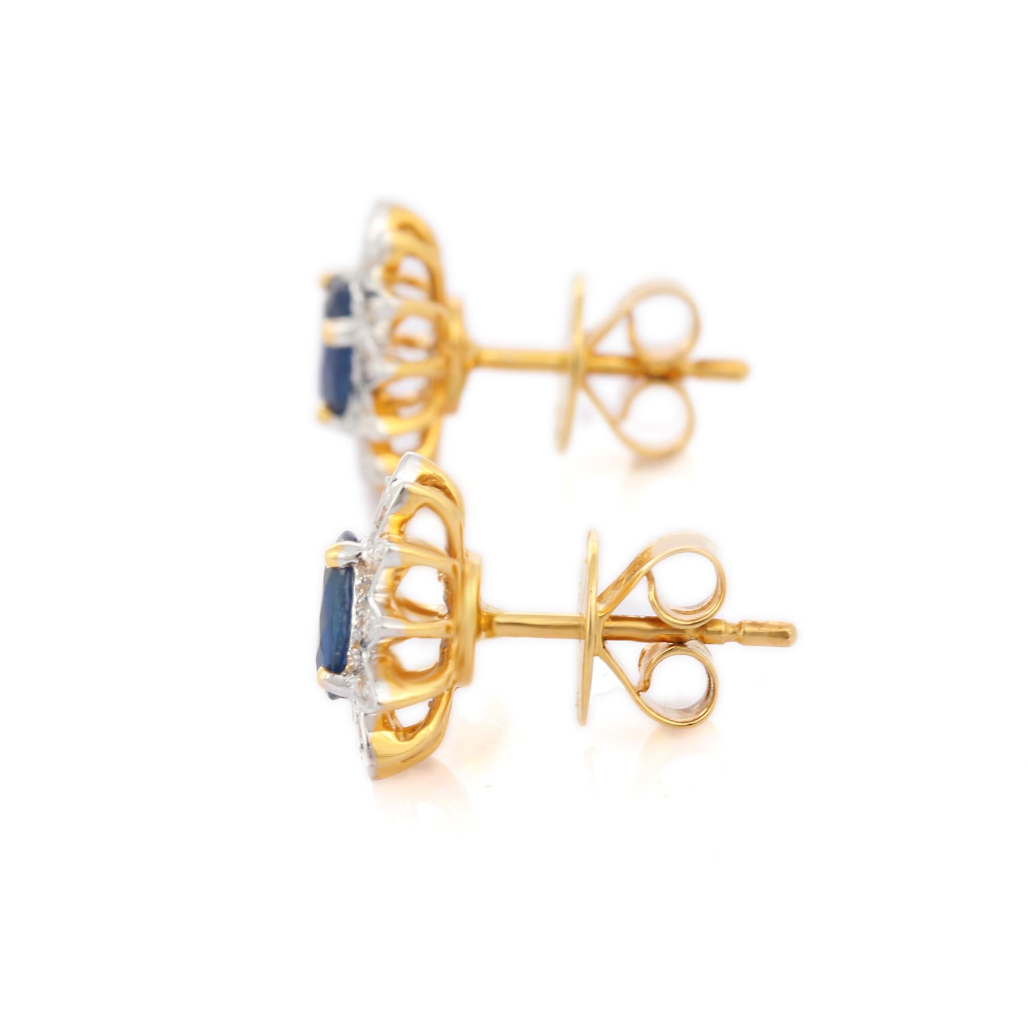 Oval Cut Natural Blue Sapphire and Diamond Flower Studs in 18 Karat Solid Yellow Gold For Sale