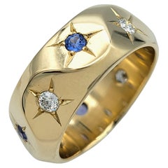 Anello a fascia angolare con zaffiro blu naturale e diamante in oro giallo 14 carati