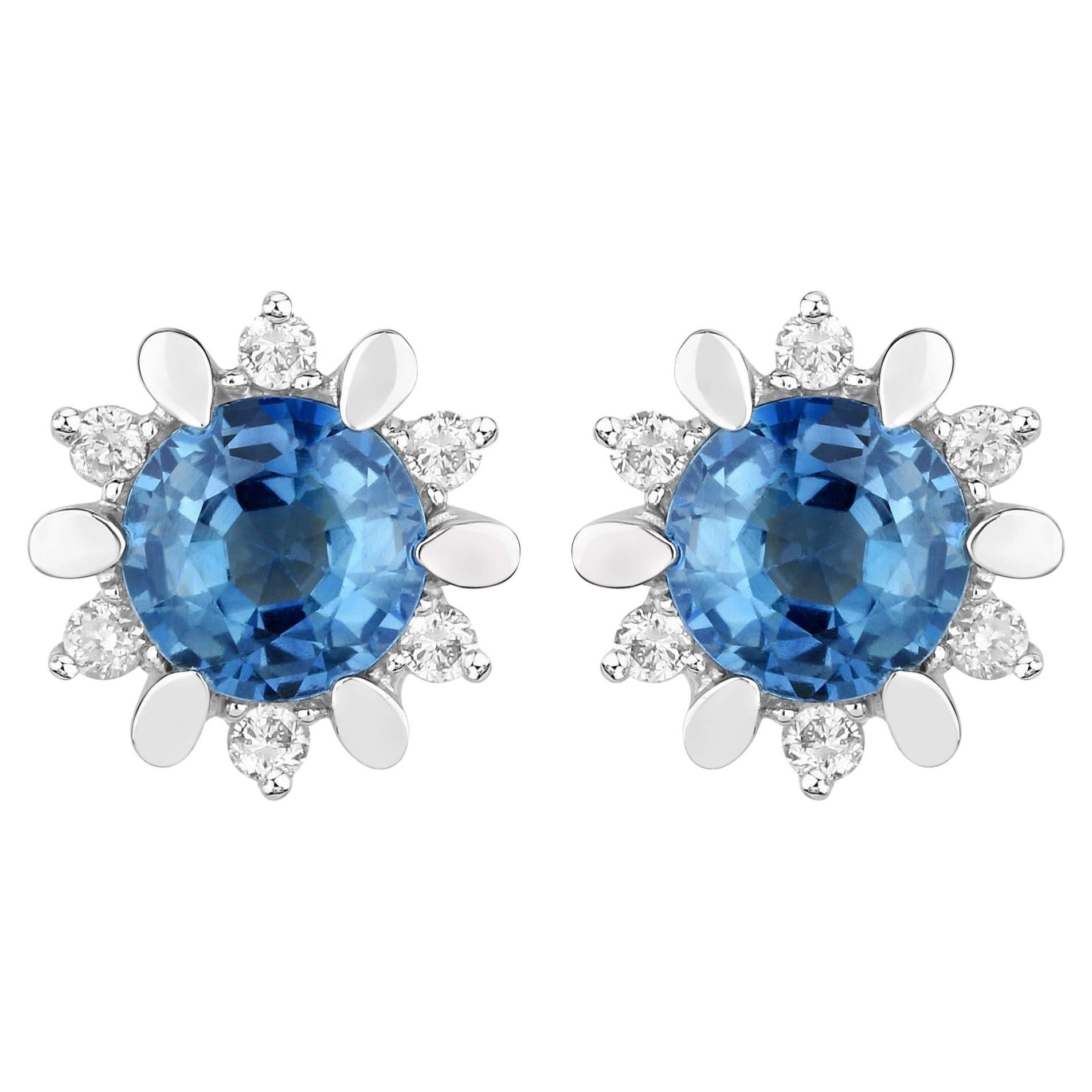 Clous d'oreilles en or blanc 14 carats avec saphirs bleus naturels et diamants totalisant 1,90 carat