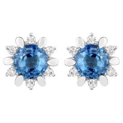 Clous d'oreilles en or blanc 14 carats avec saphirs bleus naturels et diamants totalisant 1,90 carat