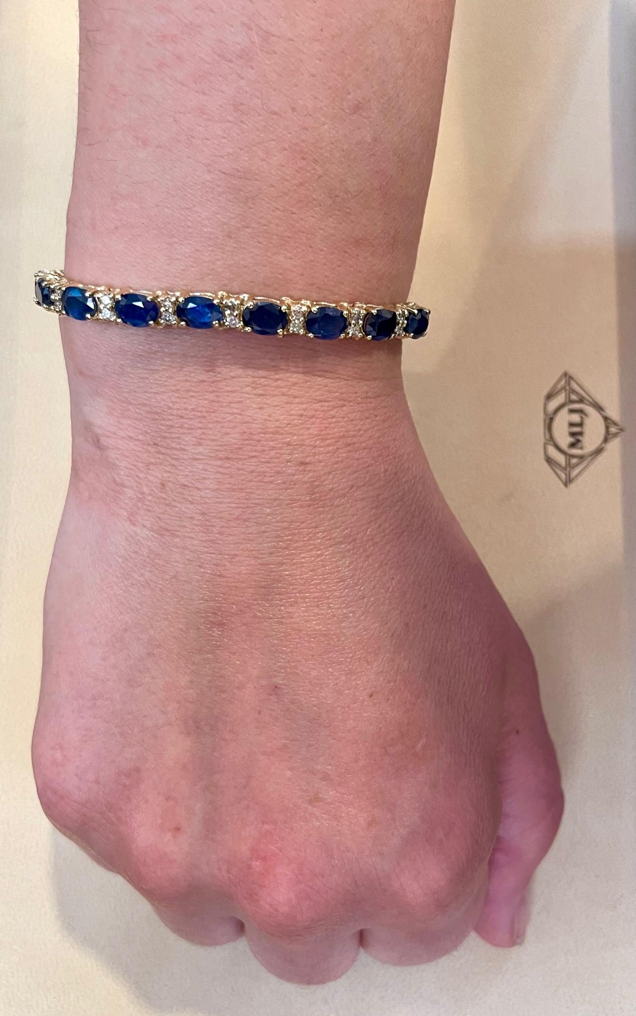  Natural Blue Sapphire &  Diamond Tennis Bracelet 14 Karat Yellow Gold 7  Inch
This exceptionally affordable Tennis  bracelet has  19 Oval  stones of sapphire set in a 14 Karat yellow gold
Total weight of Sapphire is approximately 19 carat. Total