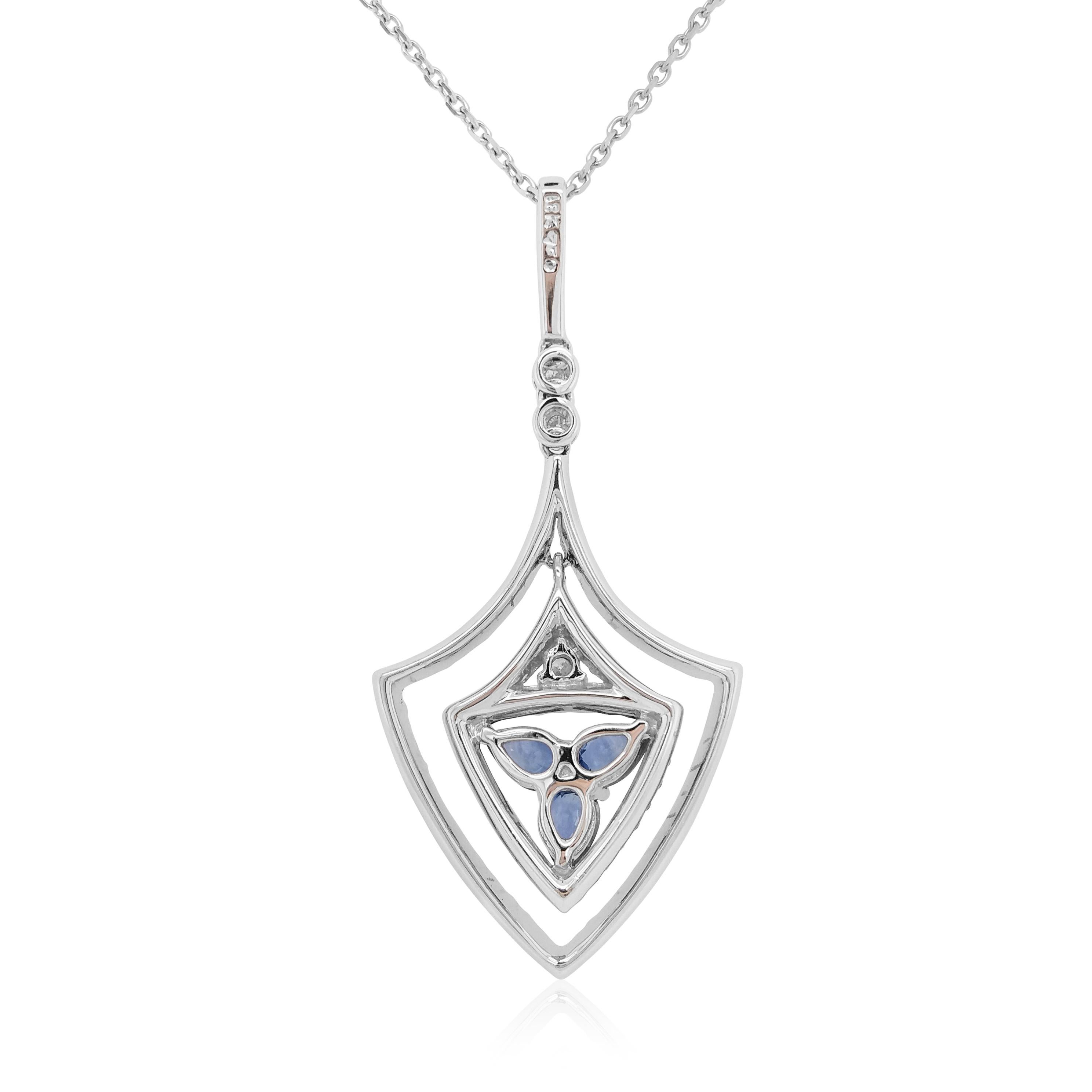 This unique pendant features striking natural blue sapphires in a contemporary diamond arrow-motif. The perfect piece to take you from day to night, this pendant will elevate any outfit.
-	Pear Shape Blue Sapphire total 0.66 carat
-	Round Brilliant