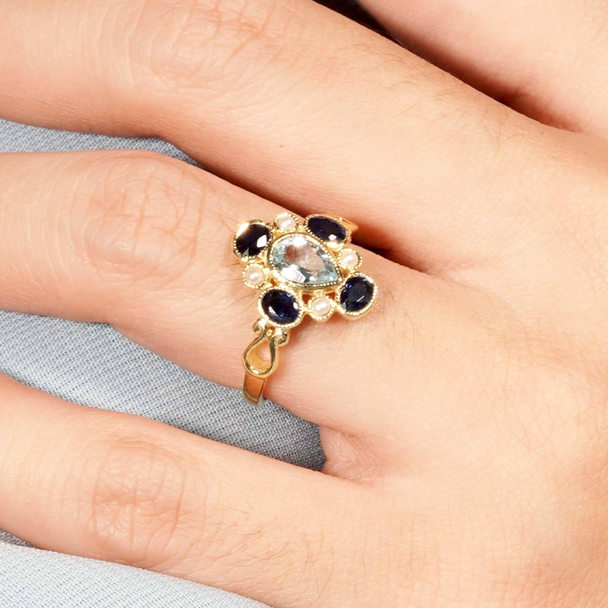 For Sale:  Natural Blue Sapphire Blue Topaz Pearl Vintage Style Cluster Ring in 9K Gold 9