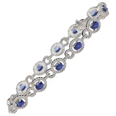 Natural Blue Sapphire Bracelet 18 Karat White Gold and Diamonds Oval Sapphire