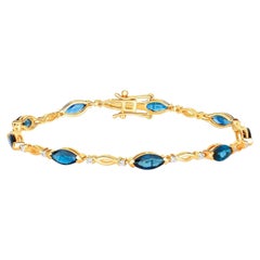 Bracciale con zaffiro blu naturale e diamanti 5,54 carati in oro giallo 14K
