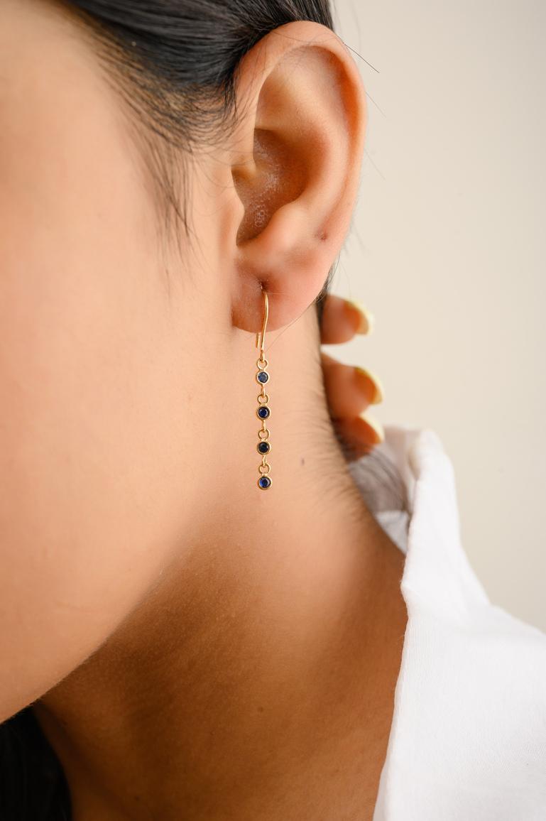Blue Sapphire Dangle earrings to make a statement with your look. These earrings create a sparkling, luxurious look featuring round cut gemstone. Lightweight and gorgeous, these are the great bridesmaid, wedding or christmas gift for anyone on your