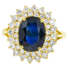 Natural Blue Sapphire Diamond 4.20 Carat 18 Karat Yellow Gold Halo Ring