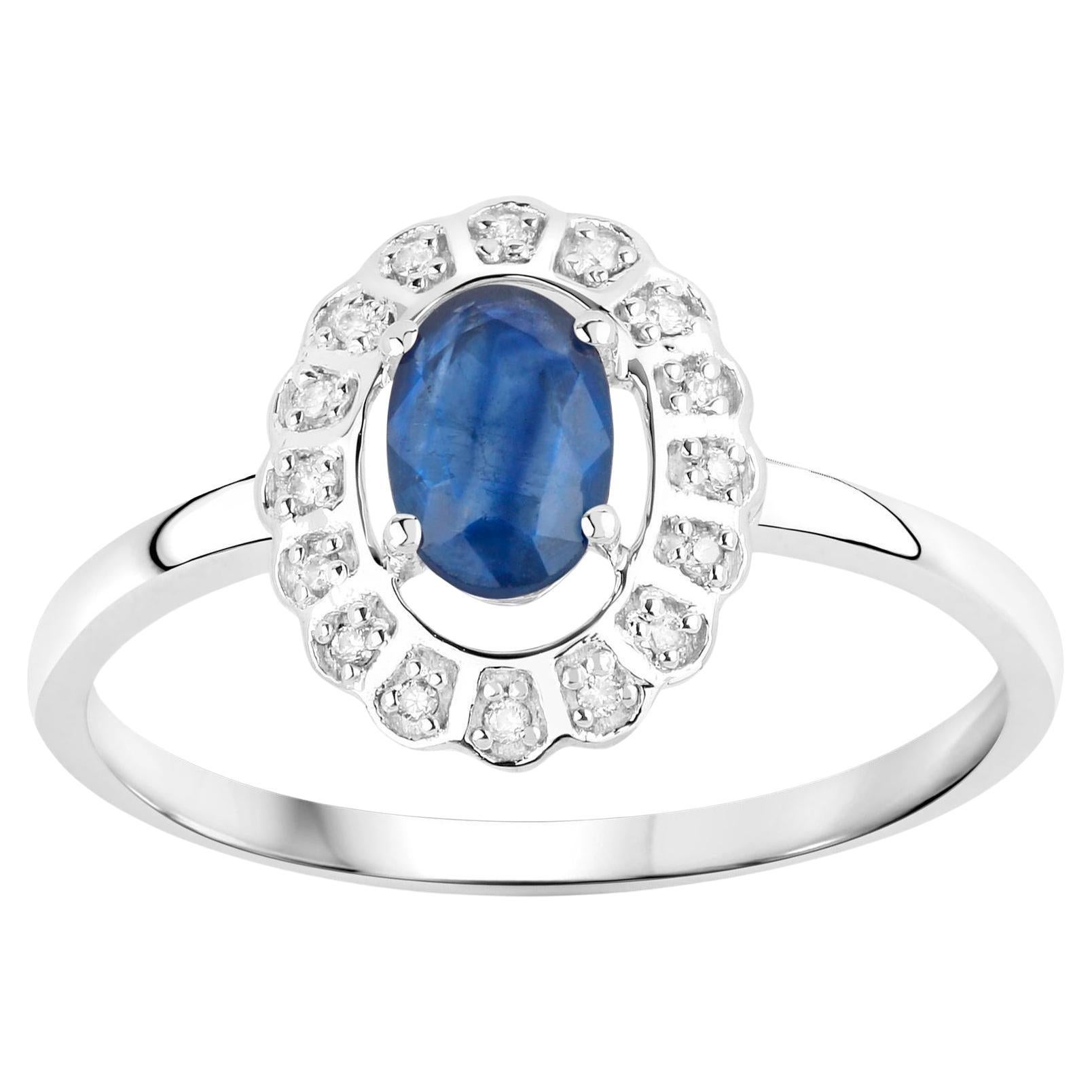 Bague en or blanc 14 carats avec saphir bleu et diamants