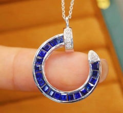 Colgante de zafiro azul natural y diamante en oro de 18k