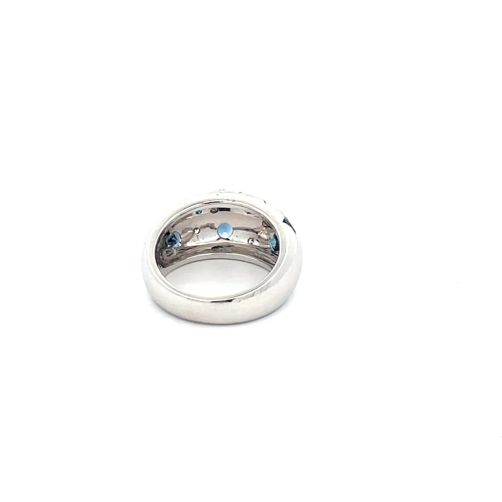 Women's Natural Blue Sapphire & Diamond Star Ring in 18 Karat White Gold For Sale