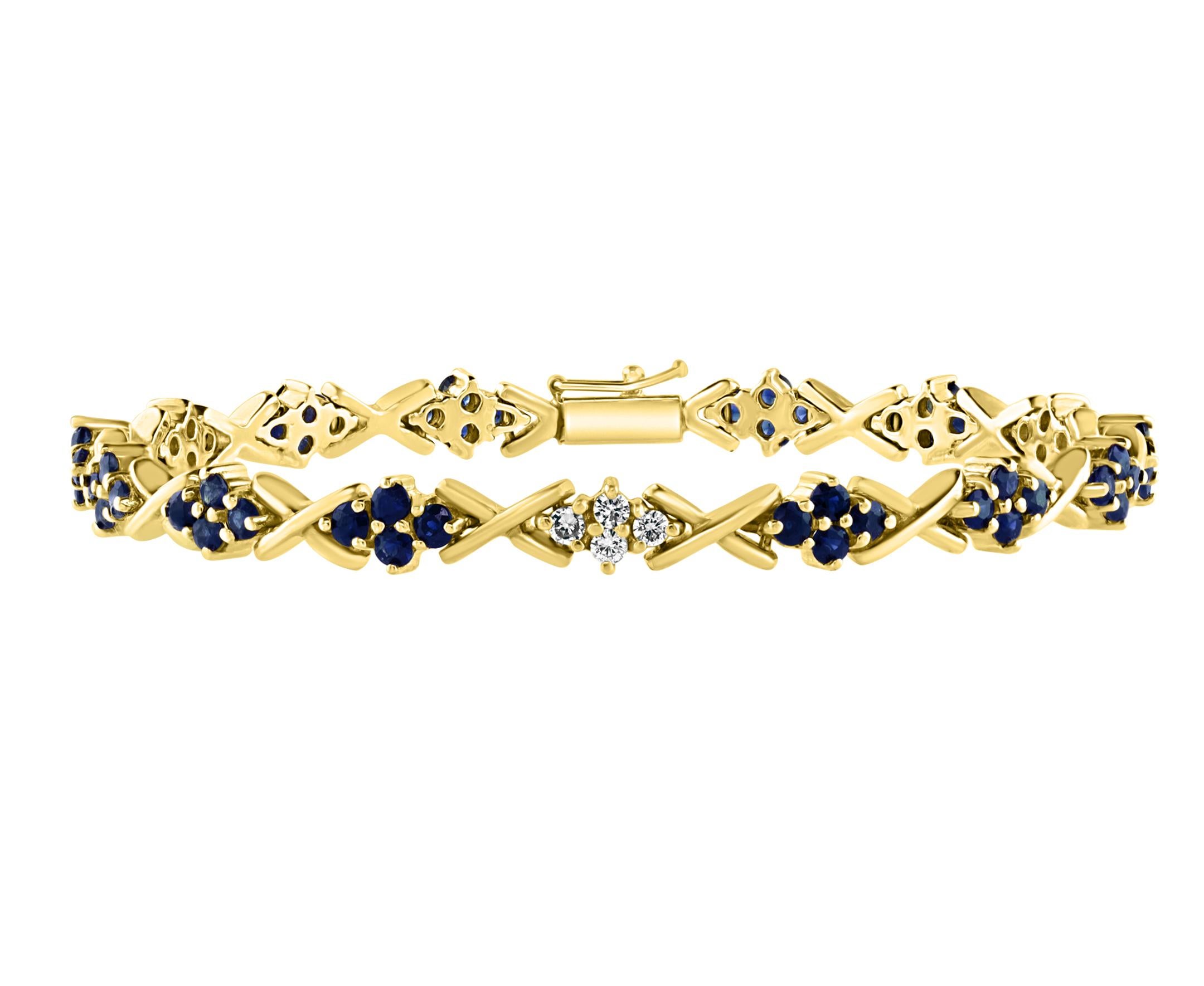  Natural Blue Sapphire &  Diamond Tennis Bracelet 14 Karat Yellow Gold 7  Inch
This exceptionally affordable Tennis  bracelet has  multiple small round stones of sapphire set in a diamond shape 
Total weight of Sapphire is approximately 3 carat.