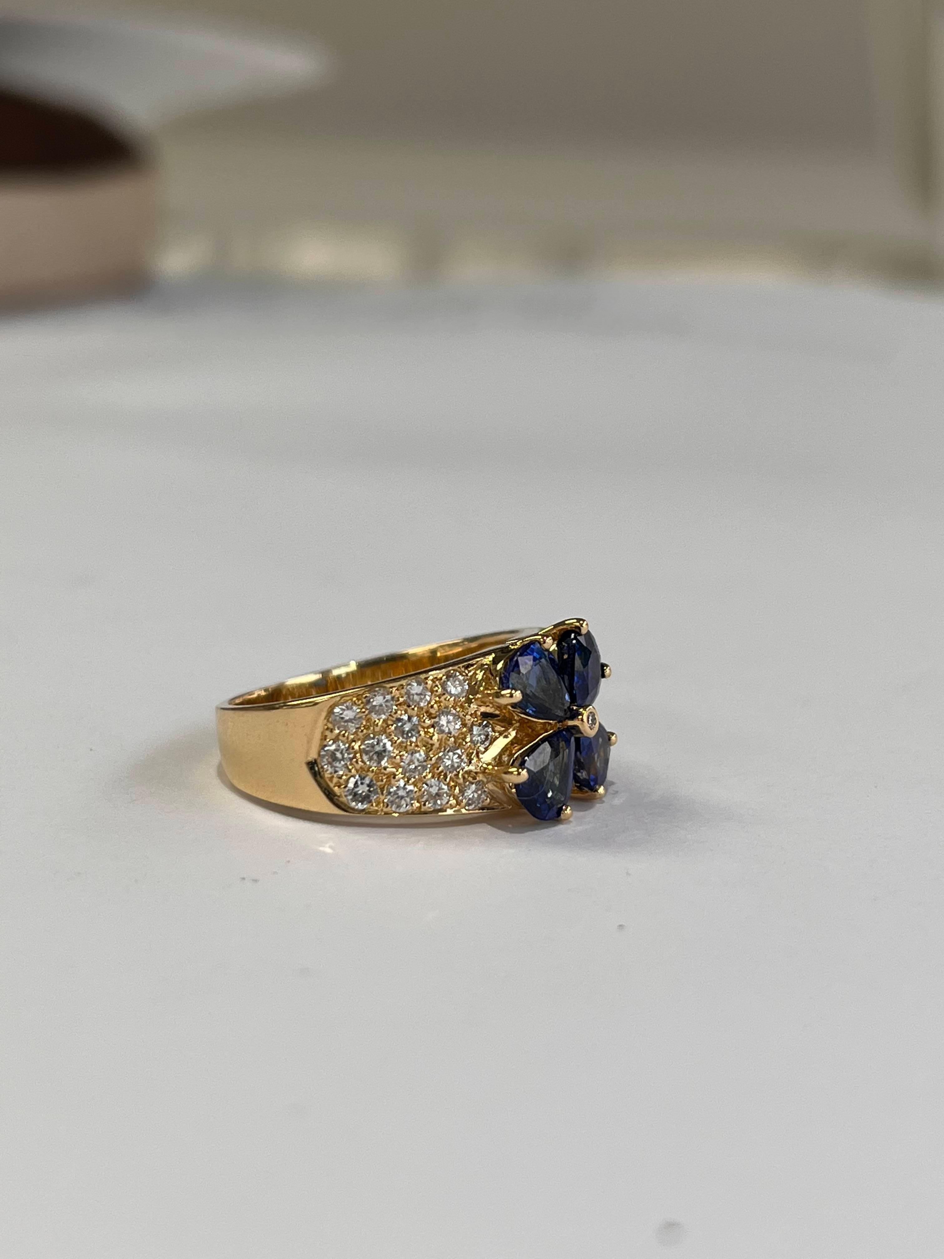 A very gorgeous and wearable Blue Sapphire Band/ Cocktail Ring set in 18K Yellow Gold & Diamonds. The weight of the Blue Sapphires is 1.81 carats. The Blue Sapphires are of Ceylon origin. The weight of the Diamonds is 0.68 carats. The dimensions of