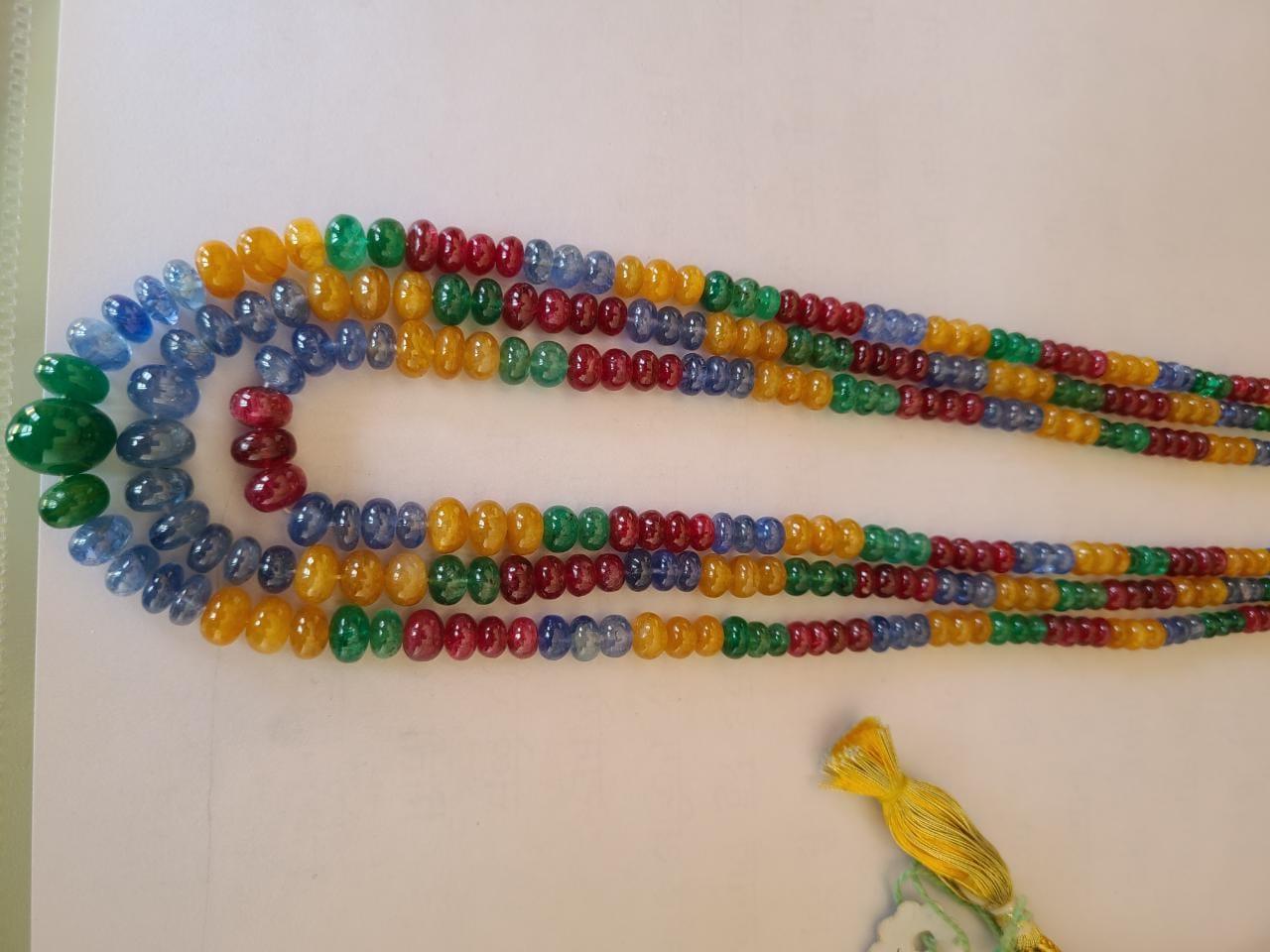 A very gorgeous & one of a kind, beaded, multi strand necklace made using natural Blue Sapphire, Emerald, Spinel & Yellow Sapphires. The Blue & Yellow Sapphires are completely natural, without any treatment and originate from Burma. The Spinel is
