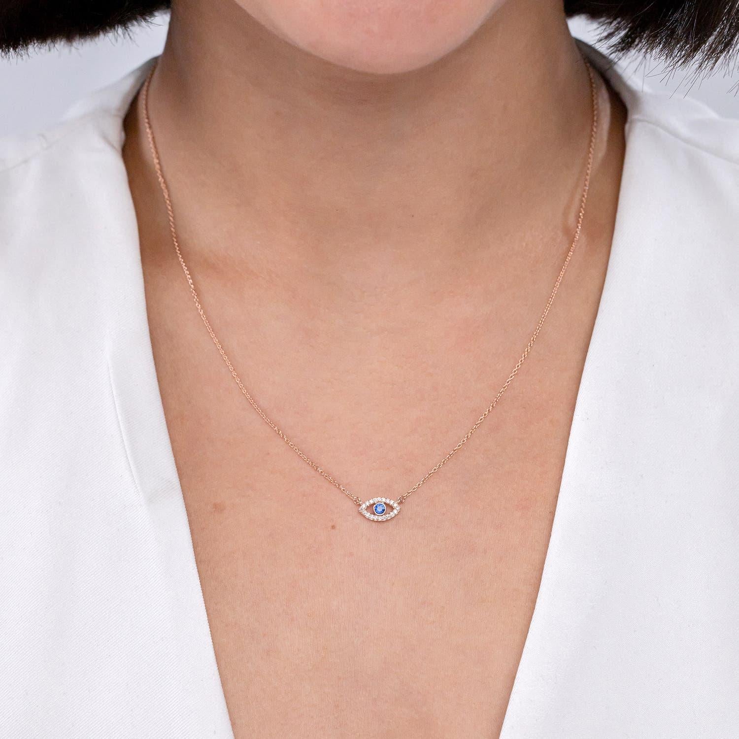 Modern Natural Blue Sapphire Evil Eye Pendant with Diamond Accents in 14K Yellow Gold For Sale