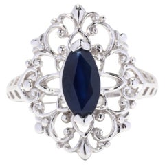 Bague navette filigrane en platine avec saphir bleu naturel, fleur