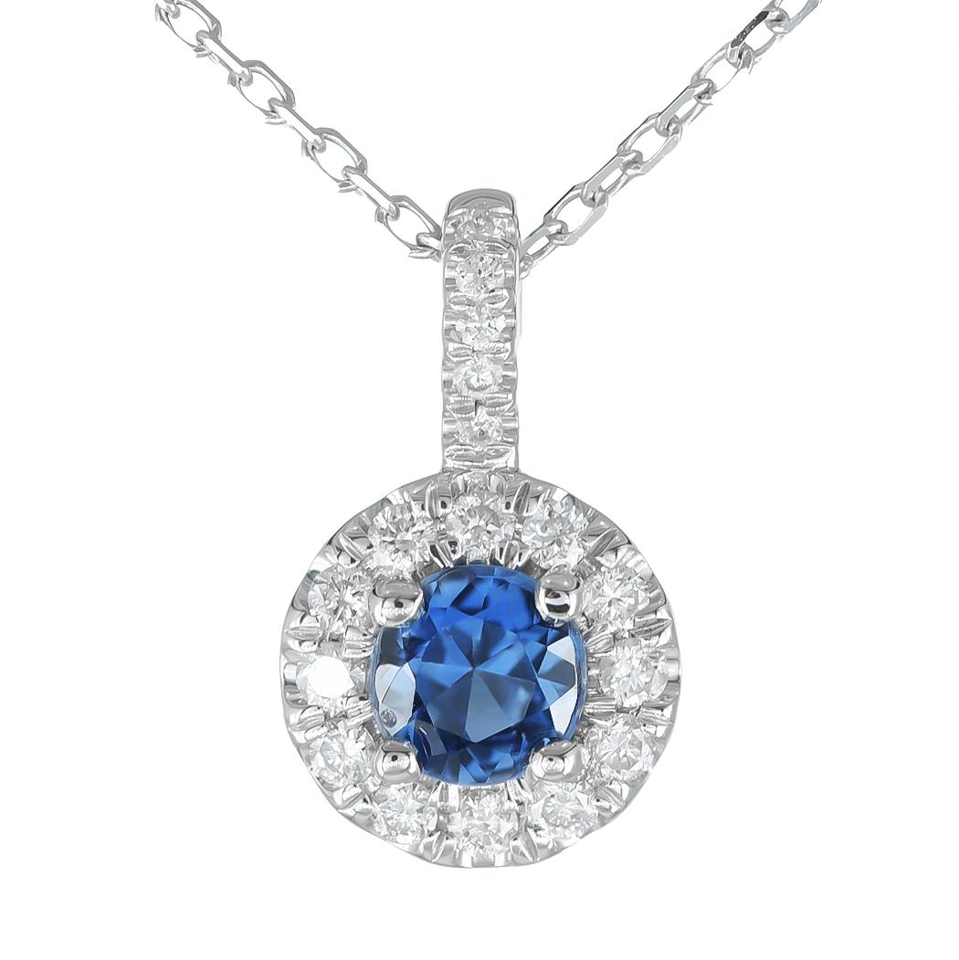 Discover the timeless elegance of natural blue sapphire with this exquisite pendant, beautifully set in 14K white gold. Complemented by sparkling diamonds, this piece showcases exceptional craftsmanship and the enchanting beauty of these precious