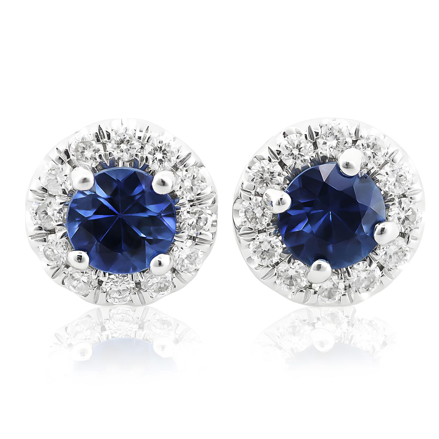 Discover the exquisite elegance of natural blue sapphires, beautifully set in 14K white gold earrings. This stunning pair, complemented by sparkling diamonds, showcases the finest craftsmanship and the captivating beauty of these precious gemstones.
