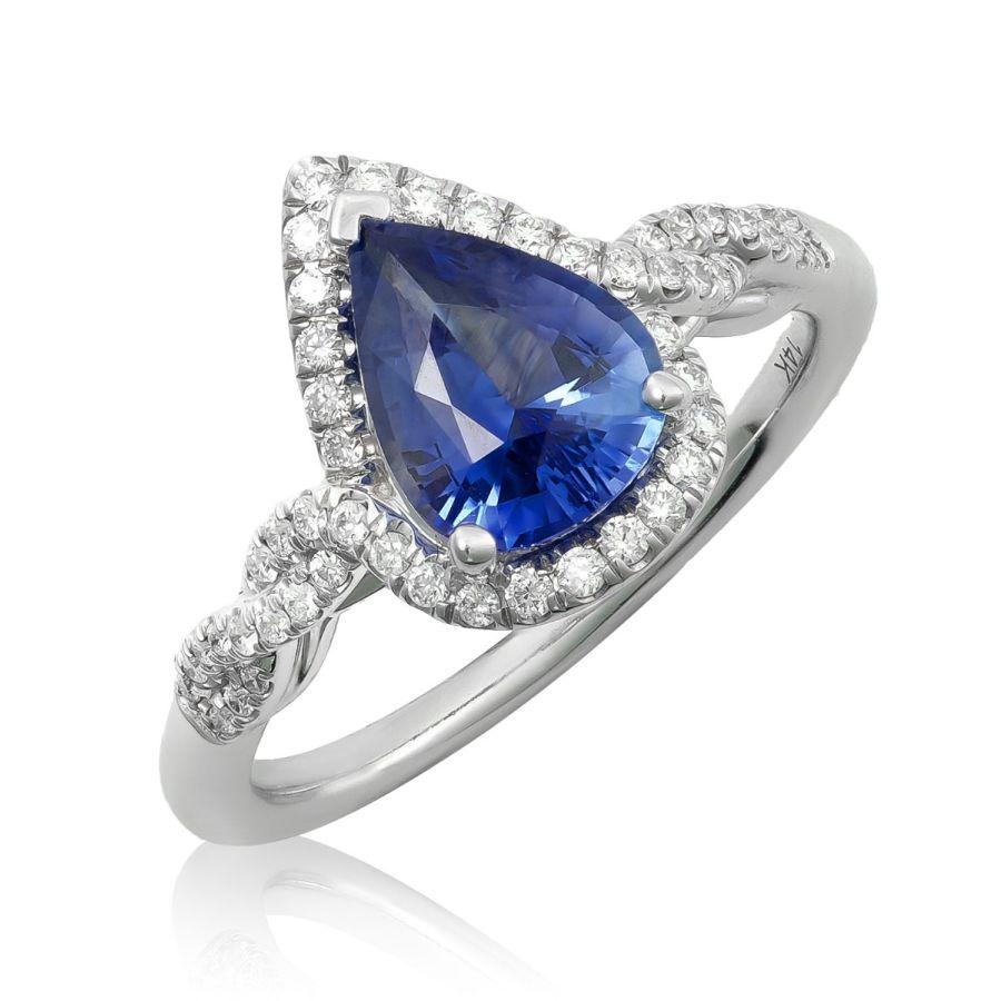 Scopri l'eleganza senza tempo di questo anello con zaffiro blu naturale, con uno zaffiro a forma di pera da 1,56 carati incastonato in un raffinato oro bianco 14K. Accentuato da 0,23 carati di diamanti scintillanti, questo anello incarna la