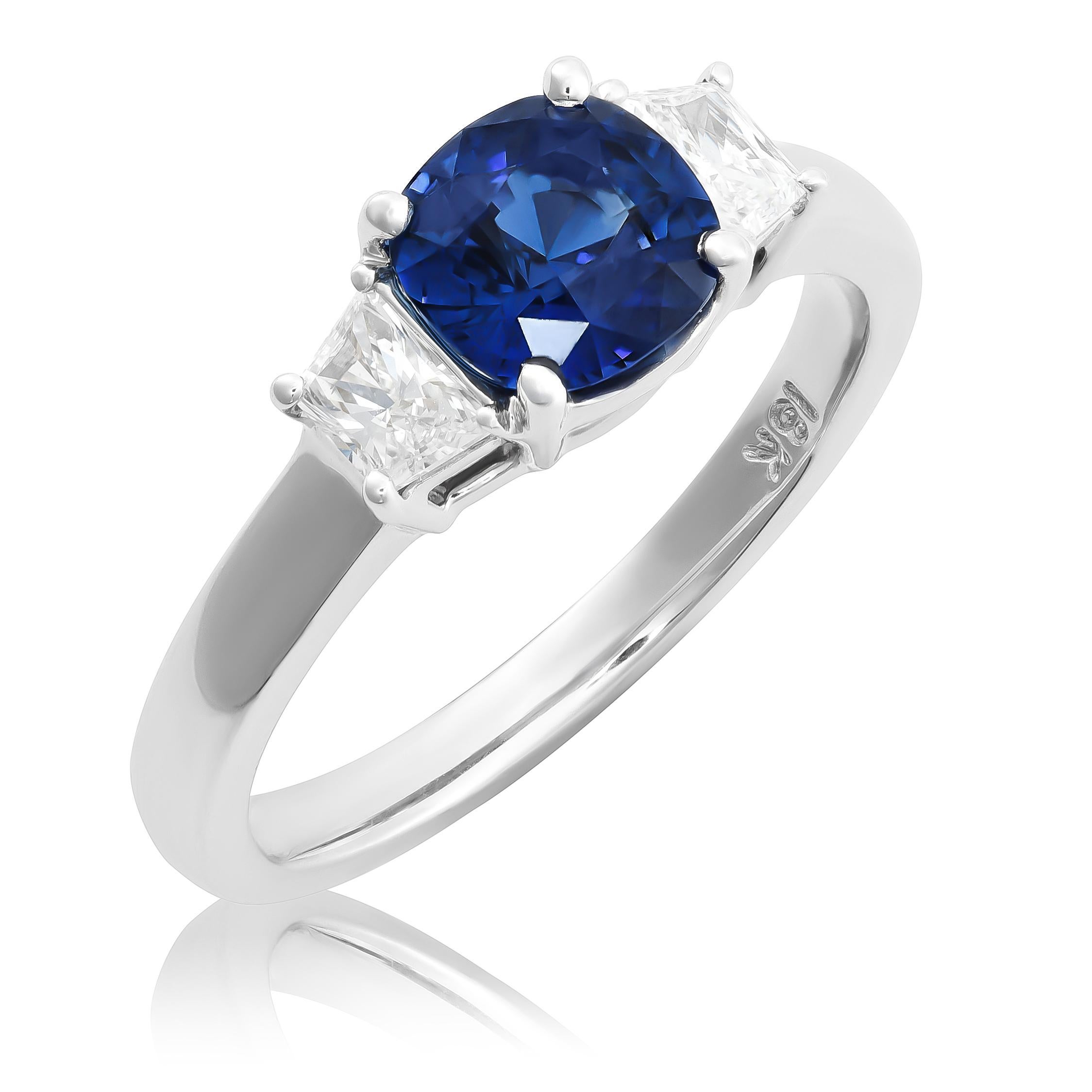 Discover the elegance of this stunning 14K white gold ring, featuring a beautiful natural blue sapphire complemented by brilliant diamonds. The sapphire's deep blue hue and exceptional clarity make it a captivating centerpiece, while the diamonds