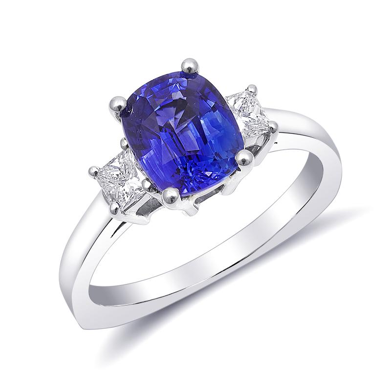 This exquisite ring features a vivid blue sapphire set in 14K white gold, accompanied by sparkling diamonds. It's a stunning piece that combines elegance with timeless beauty, perfect for any special occasion or as a cherished addition to a fine