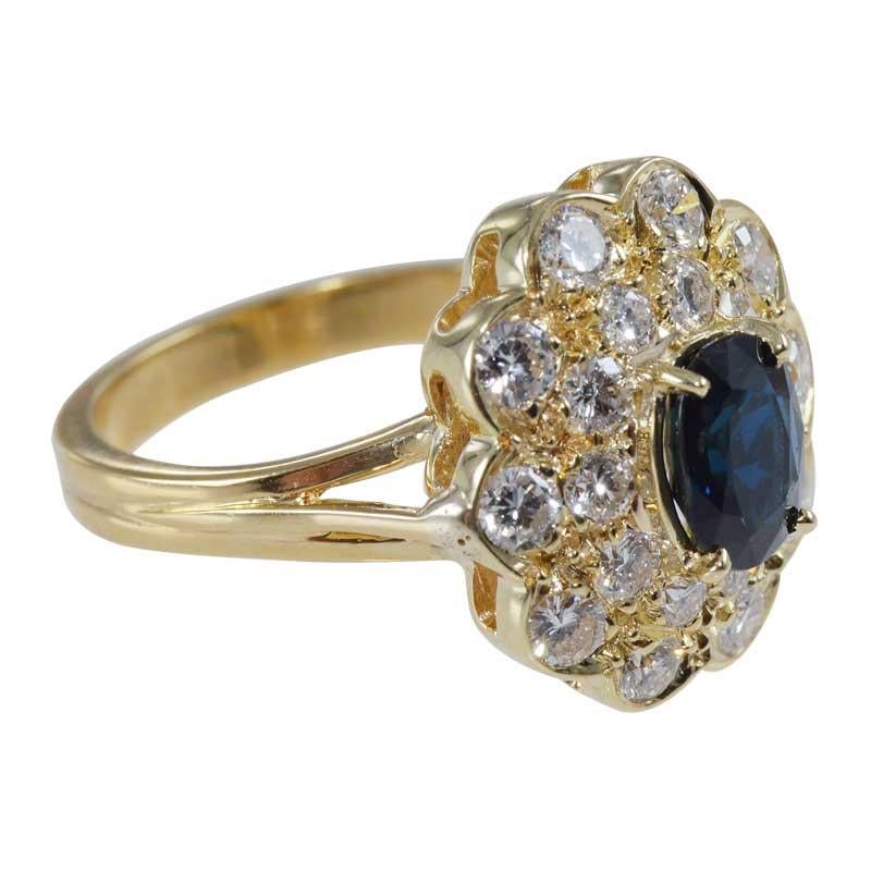Natural Blue Sapphire in a Double Diamond Halo Set in 18Kt Yellow Gold Ring In Excellent Condition For Sale In Long Beach, CA