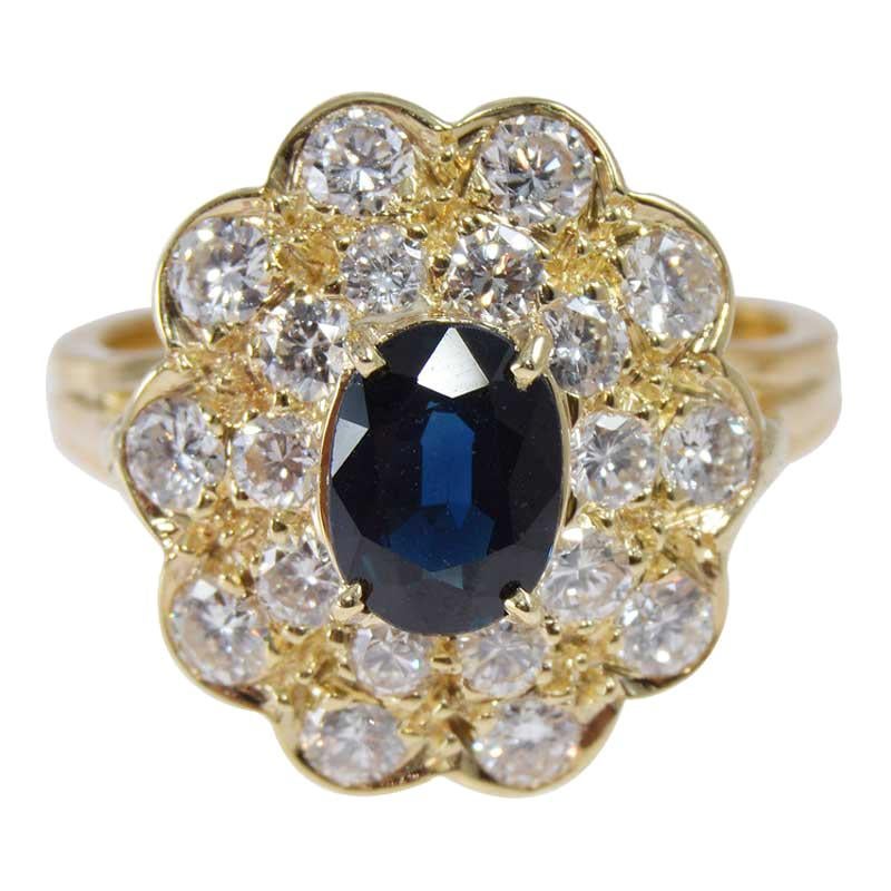 Natural Blue Sapphire in a Double Diamond Halo Set in 18Kt Yellow Gold Ring For Sale