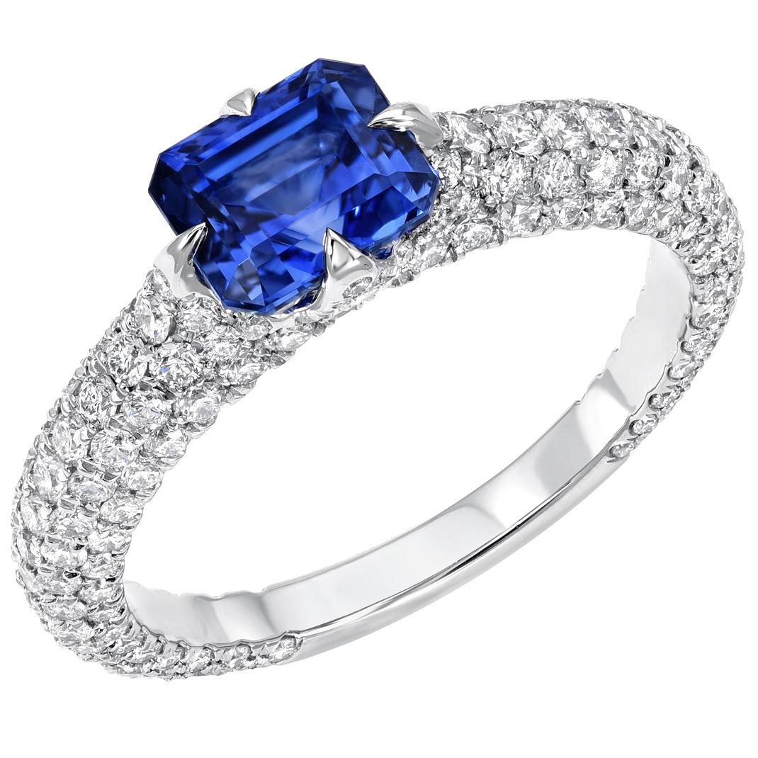 Natural, no heat Sapphire ring, showcasing a 1.42 carat emerald cut Blue Sapphire, unveiled in a 1.32 carat micro pave diamond platinum setting. 
The AGL certificate is attached to the images for your convenience.
Ring size 6. Resizing is