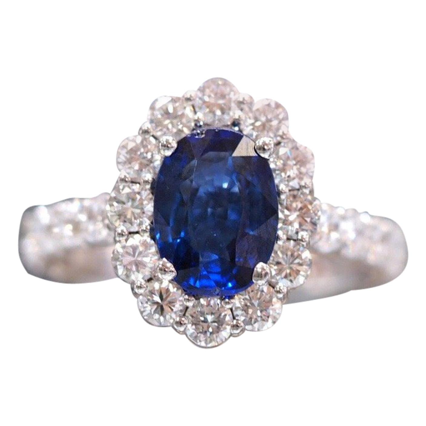 Natural Blue Sapphire Set in a Custom Made Nature Inspired Flower Halo Ring